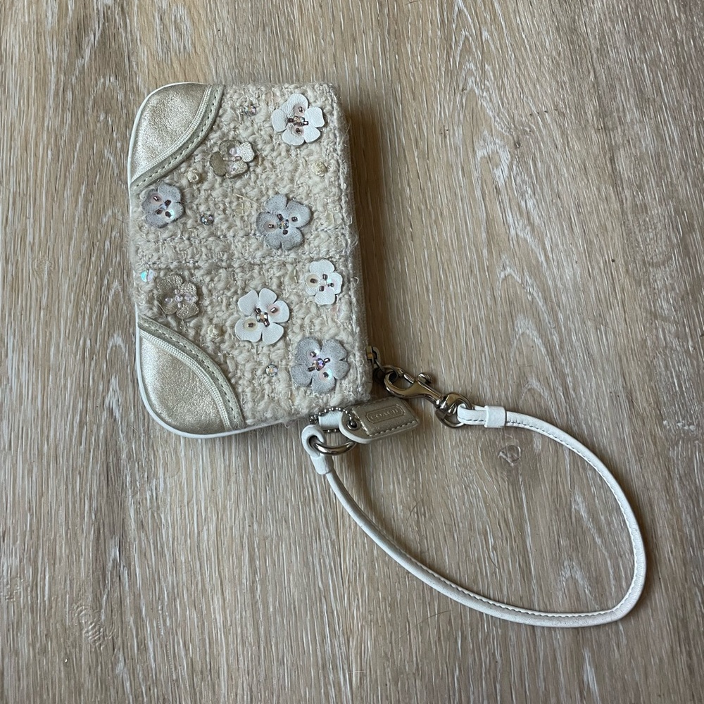 Coach offwhite tweed wristlet with flowers